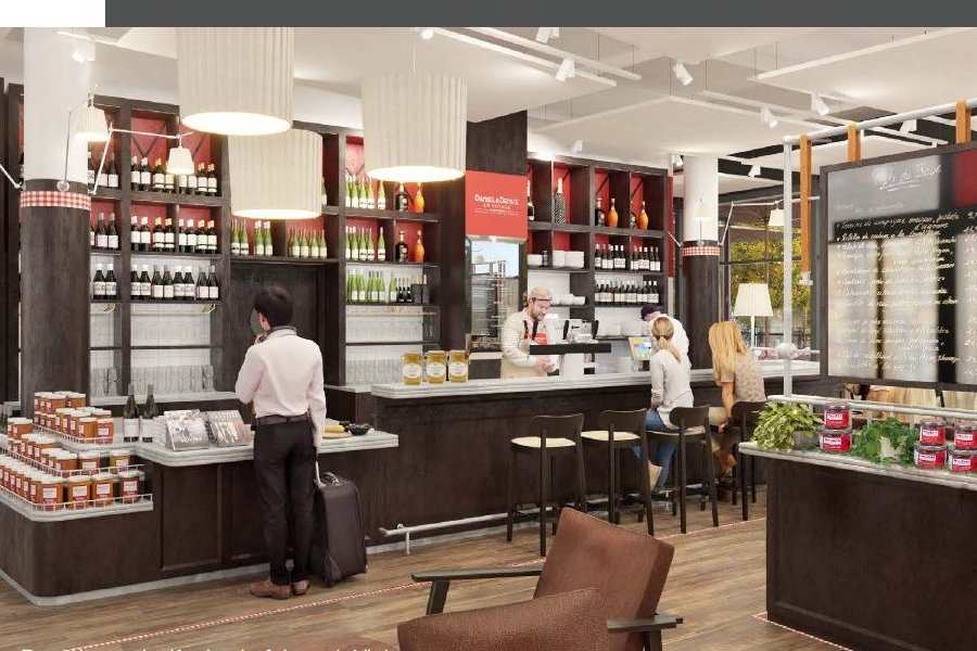 Espace de restauration avec comptoir et rayonnages